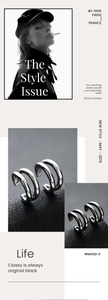 Close-up of triple-row silver ear clips with a high-polished minimalist metal finish