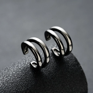 Minimalist double-hoop cuff earrings in polished black metal for non-pierced ears