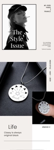 Gros plan sur pendentif pièce argentée avec motif étoile et détail de chaîne gourmette