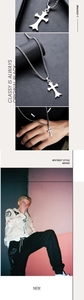 Macro detail of silver gothic cross pendant with high-quality polished steel chain