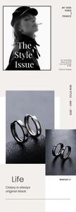 Détail de boucles d'oreilles créoles noires polies avec fermoir cliquet et design épuré