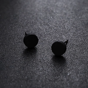 Minimalist matte black stud earrings for men and women with sleek circular design