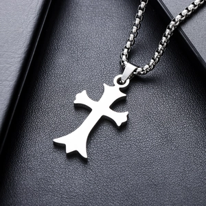 Irregular gothic cross pendant necklace in silver stainless steel on black leather background
