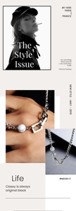 Detail of silver geometric link chain with marble bead and interlocking rectangular rings