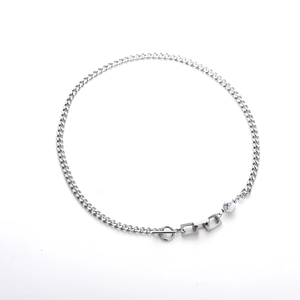 Silver chain necklace with marble bead and toggle clasp on a clean white background