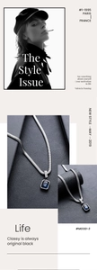 Macro view of silver snake chain necklace with deep blue rectangular gemstone pendant