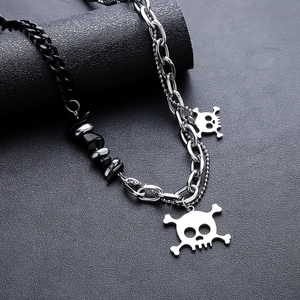 Punk skull pendant necklace with silver and black asymmetric beaded splice chains
