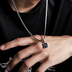 Titanium steel snake chain necklace for men featuring a deep blue gemstone pendant