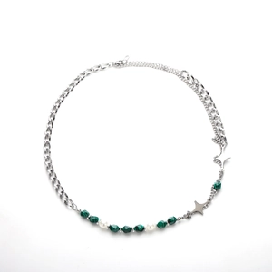 Cross star necklace with green beads and silver metal chain in asymmetrical modern style