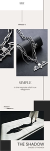 Détail d'un collier double couche avec pendentif chauve-souris et lettre H style goth