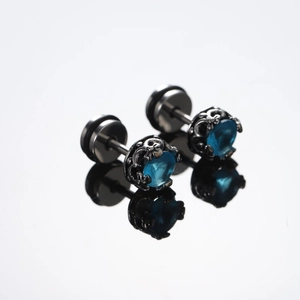 Gothic titanium steel stud earrings featuring a deep blue zircon with vintage finish