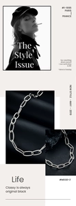 Detail of silver oval link chain necklace showing modern metallic texture on leather