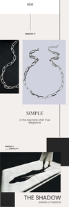 Detailed view of silver stainless steel paperclip chain with lobster clasp and extender