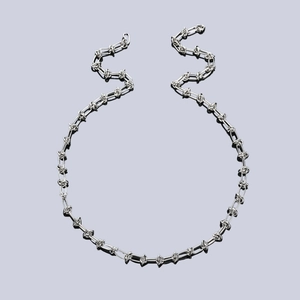 Industrial style silver chain necklace with barbed wire design nodes on polished steel