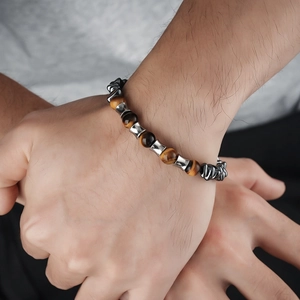 Men's tiger eye beaded bracelet with silver metal spacers and grey hematite stones