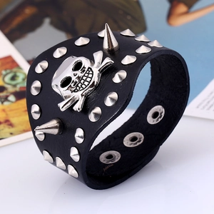 Men's punk wide leather bracelet with silver skull emblem and sharp metal spikes
