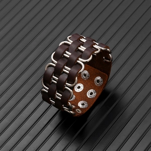 Men's wide brown leather punk bracelet with silver metal rings and snap buttons