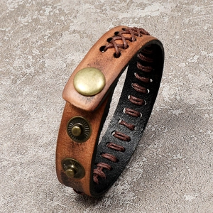 Vintage braided brown leather bracelet with adjustable bronze snap button for men