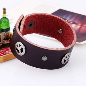 Punk leather bracelet with metal peace signs and rivets on dark brown cowhide band