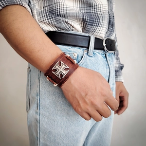 Retro punk wide leather bracelet with iron cross emblem and white stitch detail