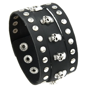 Punk black leather wide bracelet featuring silver skull charms and metal studs