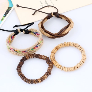 Set of 4 handmade woven leather and wooden bead bracelets in bohemian retro style