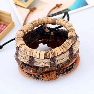 Detail of multi-layer woven bracelet set with wooden beads and genuine leather straps