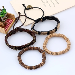 Set of four vintage woven leather bracelets with coconut shell beads for men and women