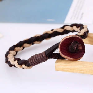 Vintage braided leather bracelet with white cotton rope and dark red wooden button closure
