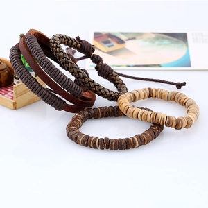 Detailed close-up of a vintage 4-piece multilayer leather and wooden bead bracelet set for men