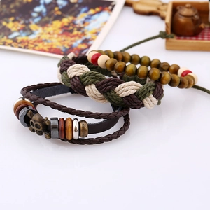 Multilayer vintage woven leather bracelet set with bronze skull and wooden beads