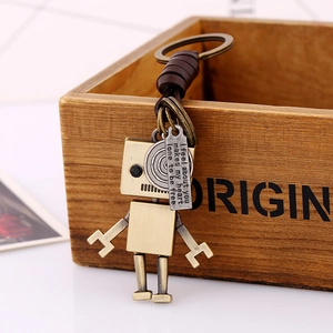Steampunk cute robot keychain made of vintage brass alloy with brown leather detail