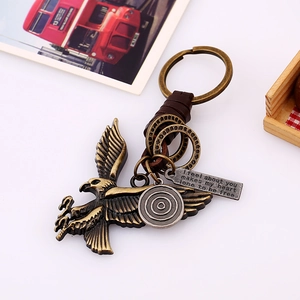 Vintage multi-layer braided leather keychain with bronze eagle pendant and metal ring charm