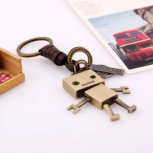 Retro bronze robot keychain with genuine leather strap and engraved metal tag