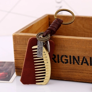 Vintage braided leather keychain with alloy comb pendant and antique bronze metal ring