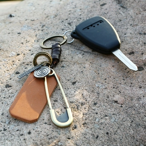 Handwoven leather keychain with vintage metal charms and bronze car key ring set