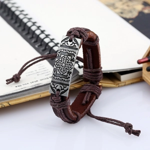 Retro brown leather bracelet featuring a silver metal cross plaque and braided ropes
