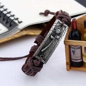 Vintage leather bracelet with antique silver rose flower metal plate and braided cord