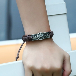 Vintage braided leather peace sign bracelet with adjustable cord and silver metal plate