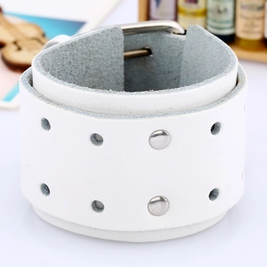 Wide white leather cuff bracelet featuring silver metal studs and buckle detail
