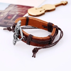 Retro braided brown leather bracelet with antique silver clasp and bohemian design
