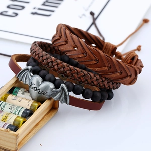 Multilayer vintage leather bracelet set with beaded strings and winged heart charm