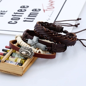 Retro four-piece handmade woven leather bracelet set with cross and metal charms