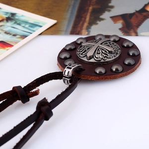 Retro punk cross pendant necklace with brown leather cord and silver metallic studs