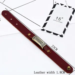 Bracelet vintage en cuir marron avec ornements en bronze de 23 cm de long
