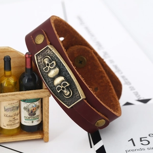 Vintage punk men's wide burgundy cowhide leather bracelet with double skull brass charms