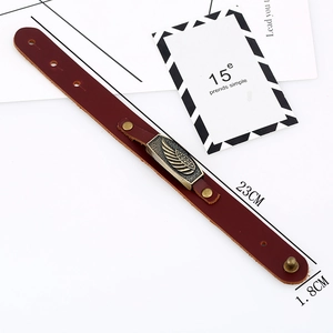 Retro burgundy leather bracelet with vintage bronze wing charm and adjustable metal buckle