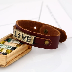 Vintage red-brown leather punk bracelet for men featuring a bronze LOVE metal plate