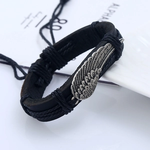 Vintage punk style black braided leather wing charm bracelet with antique silver finish