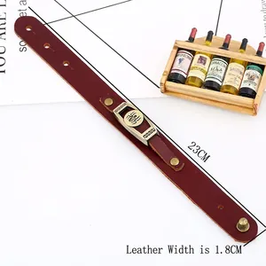 Bracciale vintage in pelle marrone con rilievo a ragno in bronzo e bottone a scatto